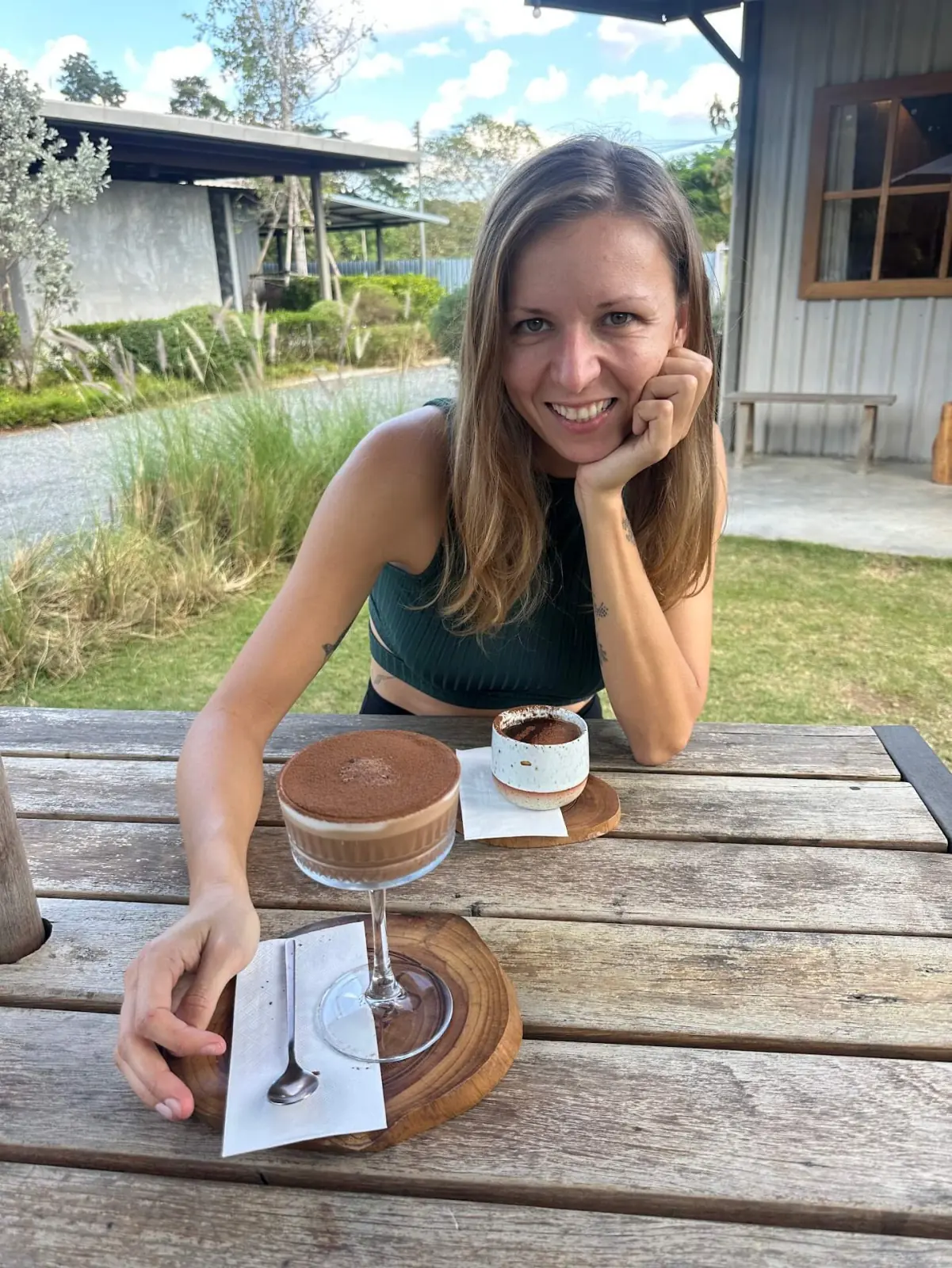 Female rider enjoying a dessert break at Skugga Estate, Northern Thailand