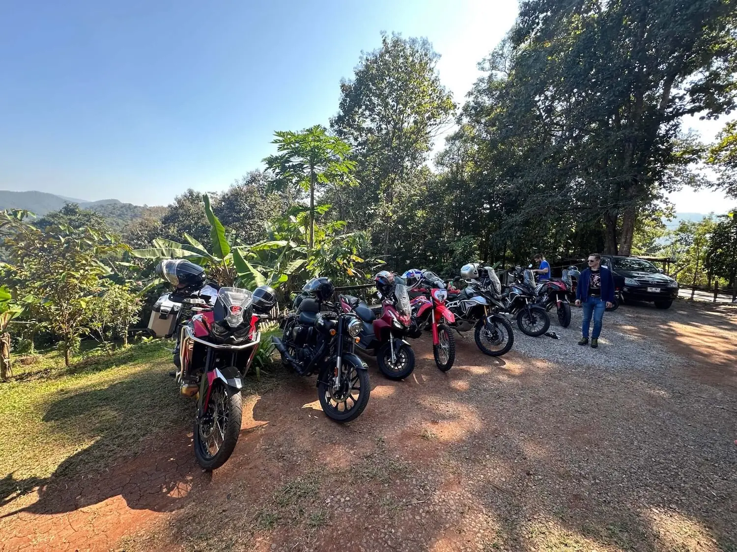 A2-friendly motorcycles parked at a viewpoint on a women-only motorcycle tour in Northern Thailand