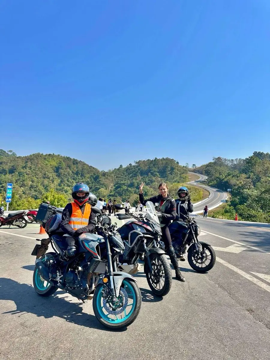 Group of women riders taking a break on tour