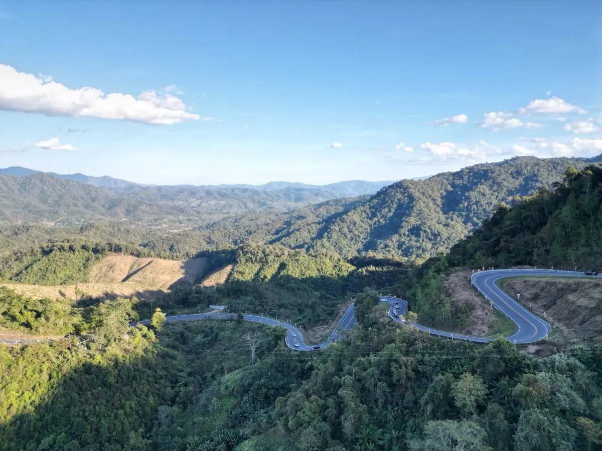 Motorcycles parked on a mountain road in Northern Thailand